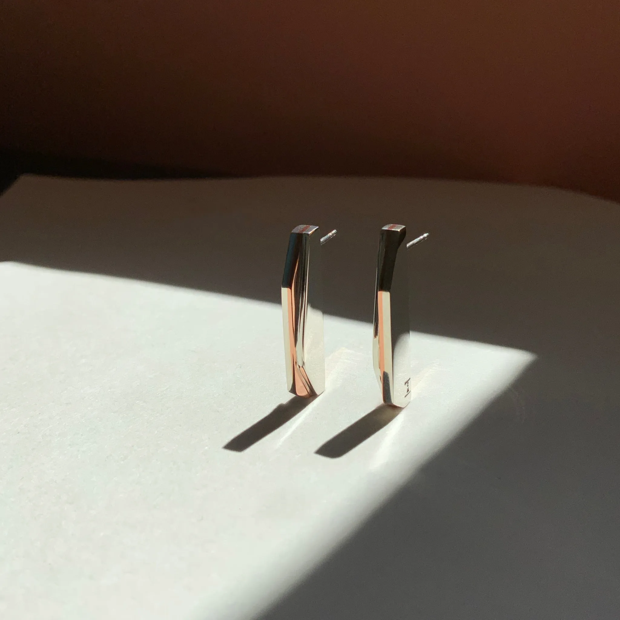 Long Two-tone Stud Earrings by Claudine Moncion