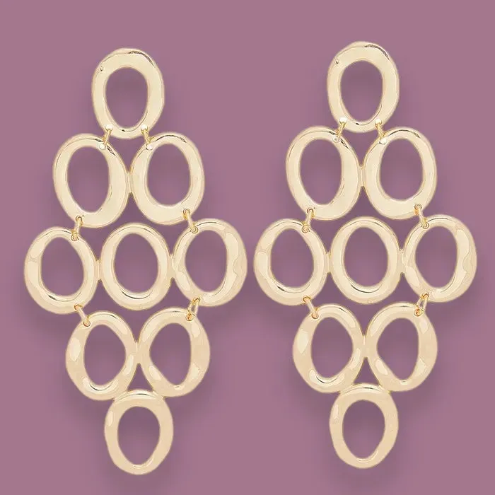 Redefine Style: Open Oval Cascade Earrings in Gold Tone